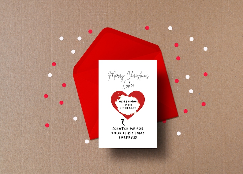 The card reads 'Merry Christmas' followed by your chosen name.
Below is a Heart that can be scratched off to reveal a secret message underneath.
Below that is an arrow pointing to the heart reading 'scratch me'