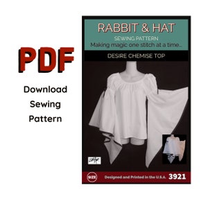 May include: A white sewing pattern for a peasant top with long, flowing sleeves. The pattern is called "Desire Chemise Top" and is part of the "Rabbit & Hat" sewing pattern collection. The text "Making magic one stitch at a time..." is also included on the pattern.