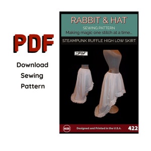 May include: A sewing pattern for a steampunk ruffle high low skirt. The pattern is called "Rabbit & Hat" and includes instructions for making a skirt with a high-low hemline and ruffles. The pattern is designed and printed in the U.S.A. and is available in size 422.