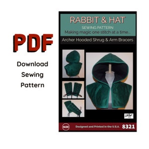 Puede incluir: Patrón de costura PDF para una capucha, brazaletes y un sombrero. El patrón se titula "Rabbit & Hat Sewing Pattern: Making magic one stitch at a time... Archer Hooded Shrug & Arm Bracers". El patrón está diseñado e impreso en los EE. UU. y tiene el número de patrón 8321.