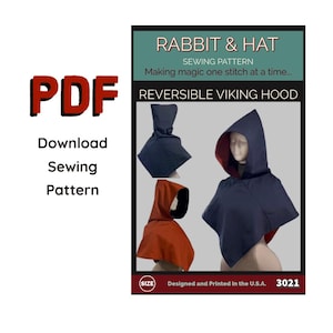 Può includere: Un modello di cucito PDF per un cappuccio vichingo reversibile. L'immagine mostra un cappuccio blu navy con interno rosso e un cappuccio arancione. Il testo recita "Rabbit & Hat Sewing Pattern" e "Reversible Viking Hood."