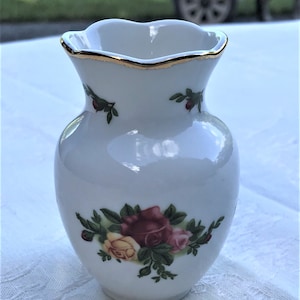 Royal Albert Old Country Roses Mini Vase decorated with roses.