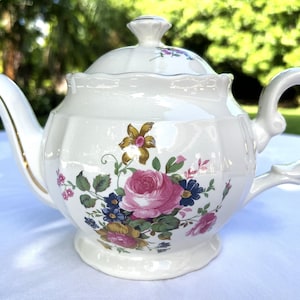 Crown Dorset Tea Pot with Roses made in Staffordshire, England.