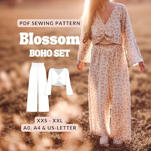 May include: A PDF sewing pattern for a Blossom Boho Set, featuring a two-piece outfit with a long-sleeved, V-neck, front-twist crop top and wide-leg trousers in a floral print. Includes technical line drawings for sizes XXS to XXL in A0, A4, and US-Letter formats.