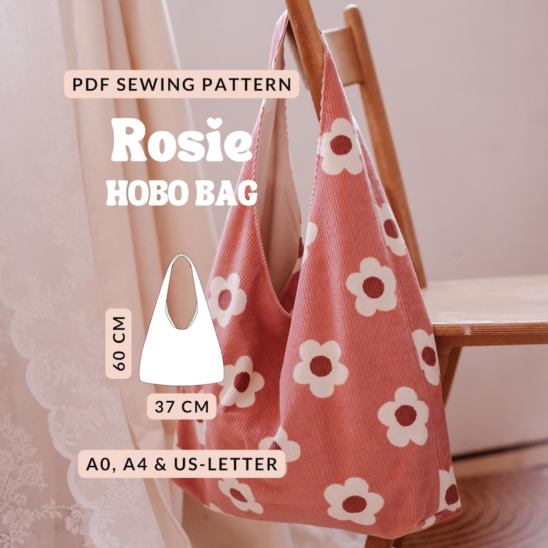 May include: A pink corduroy hobo bag with a white flower pattern. The bag is 60 cm tall and 37 cm wide. The image also includes the text "Rosie HOBO BAG" and "PDF SEWING PATTERN".