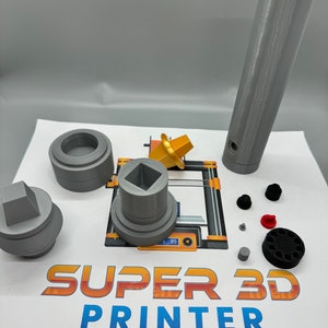May include: A set of 3D printed parts for a 3D printer. The parts are grey and include a square base, a round base, a tall cylinder, and a small square piece. The parts are arranged on a white surface with the words "SUPER 3D PRINTER" printed on the surface.