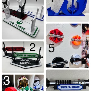 May include: Collection of custom lightsaber display stands in various colors, including white, black, red, green, and blue. Each stand features a unique design and the text "PICK A NAME". Some stands are designed with Star Wars symbols.