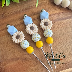 Herramienta para trazar líneas con temática floral de margaritas beige para decorar galletas