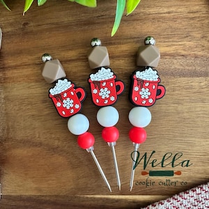 Herramienta para escribir chocolate caliente con temática navideña para decorar galletas
