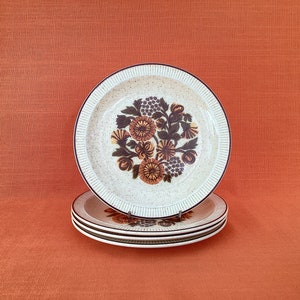 Poole Pottery tefat från 1970-talet - Tistelträ blommönster (set om 4)