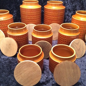 1970s Hornsea Saffron storage jars (sold separately): large 8”, medium 6”, small 4”, Biscuit barrel, Flour jar, Coffee jar, Tea jar, Sugar