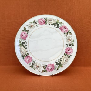A Royal Worcester ‘Elgar’ cake plate from the Royal Garden collection, 11” diameter, 1983 Royal Worcester porcelain cake plate, cheese plate