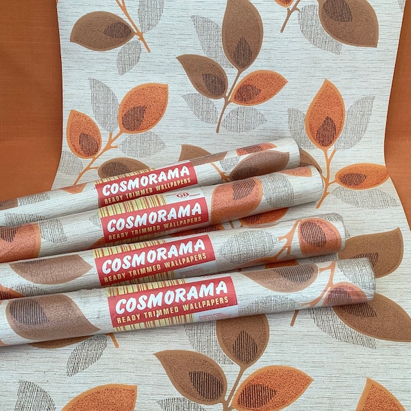 Complete 10 metre rolls of fabulous 1970s Cosmorama wallpaper with an orange and brown leafy design (rolls sold separately), retro wallpaper