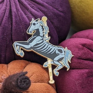 Skelton Carousel Horse Hard Enamel Pin