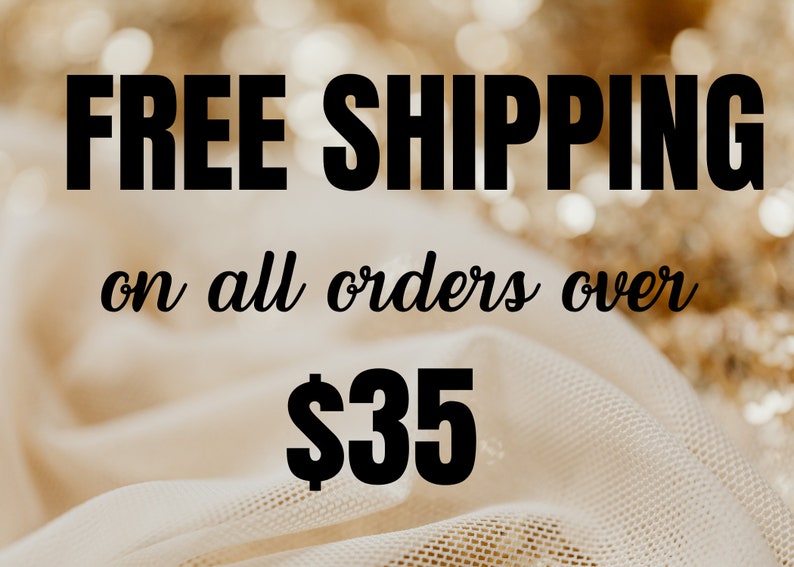 May include: Free shipping on all orders over $35. Text is displayed on a white fabric background with gold glitter.