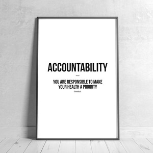 May include: Black and white motivational poster with the text "ACCOUNTABILITY - YOU ARE RESPONSIBLE TO MAKE YOUR HEALTH A PRIORITY - EYENROLLIC"