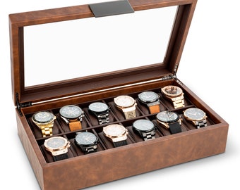 May include: A brown leather watch box with a glass top, open to reveal 15 watch slots. The box is filled with various wristwatches with different styles and colors.