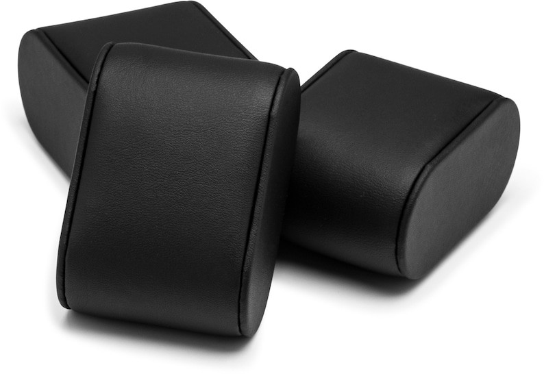 May include: Three black leather watch boxes with a rounded shape. The boxes are designed to hold and display watches.