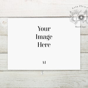 May include: A white card mockup on a white wood background. The card has the text "Your Image Here" and "AI" printed on it.