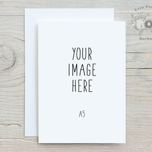May include: A white card with the text "YOUR IMAGE HERE" and "A5" printed on it. The card is sitting on a wooden surface.