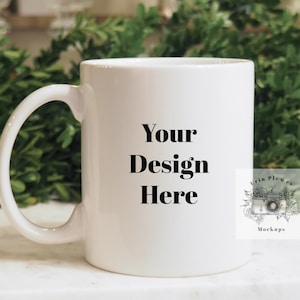 May include: White ceramic mug with a black inscription that reads "Your Design Here".