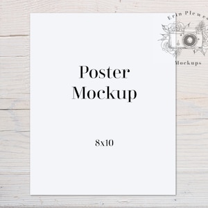 May include: A white 8x10 inch poster mockup on a light wood background. The poster is blank and ready for your design.