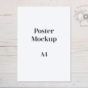 May include: A white poster mockup on a light wood background. The poster is A4 size and has the text "Poster Mockup" and "A4" printed on it.
