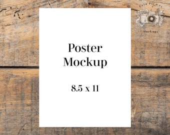 May include: A white poster mockup on a wooden background. The poster is 8.5 inches by 11 inches and has the text "Poster Mockup" printed on it.