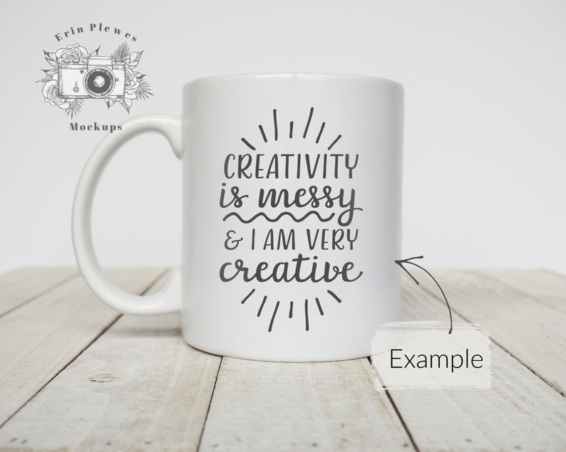 May include: White ceramic mug with a black design that reads "Creativity is messy & I am very creative".