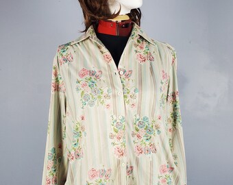 A 70s vintage blouse floral and striped print handmade polyblend button closure soft with a slight stretch