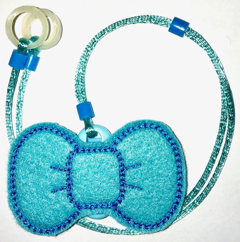 BIG BLUEBOW ..FREE SH! Childs Hearing Aids or Cochlear Implant safety Leash loss retainer cord clip ..