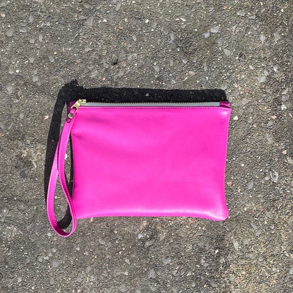 Leuchtend rosa Leder-Clutch, rosa Leder-Geldbörse mit Handschlaufe.