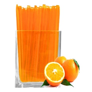May include: A glass jar filled with orange honey sticks, with two whole oranges and one orange half beside the jar.