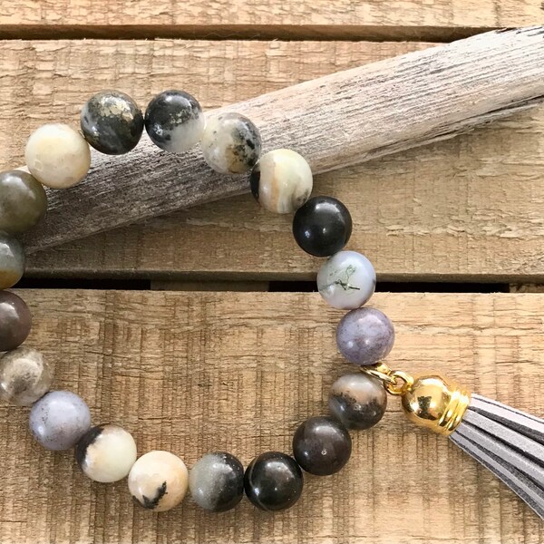 Boho Chic Stackable Multicolored Jasper Stretch Bracelet with classic gold capped Grey Leather Tassel to add some Calm and Zen to your Life!