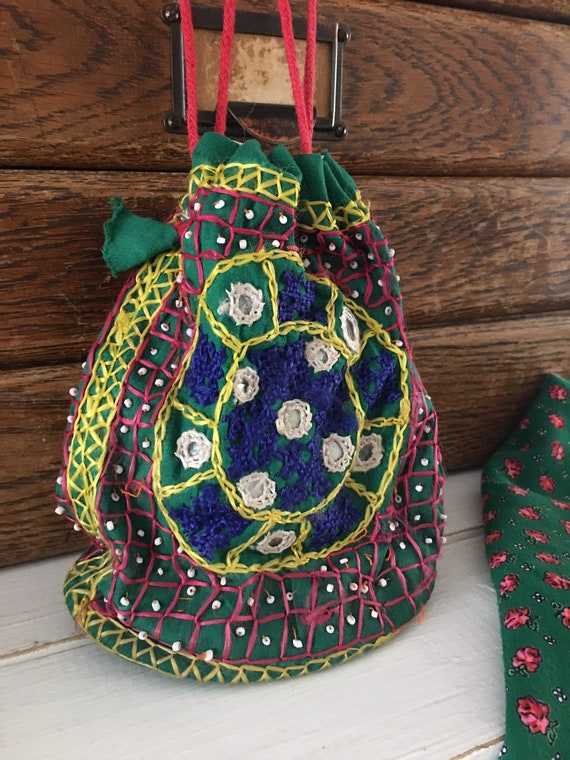 Adorable embroidered pouch bag with drawstring clo