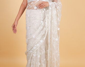 Net designer saree with thread embroidery and sequin work - cream color