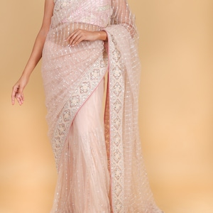 Net designer saree with thread embroidery and sequin work - pink color
