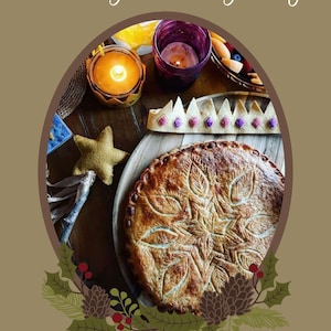 May include: A golden brown pie with a star-shaped design on top, surrounded by a crown, candles, and a bowl of fruit. The text "Celebrating Three Kings Day" is at the top of the image.