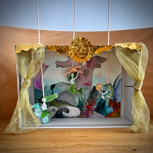 Teatro de marionetas oceánico de bricolaje