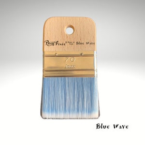 May include: A blue paint brush with a wooden handle and a metal ferrule. The brush is labeled "Paint Fixie" and "Blue Wave". The ferrule is labeled "70 Inox".