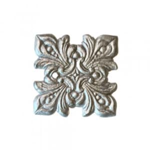 May include: Silver metal decorative embellishment with a floral design. The embellishment has a square shape with four symmetrical floral motifs.