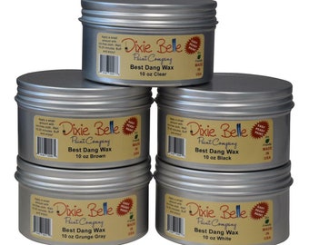 May include: Five silver cans of Dixie Belle Paint Company Best Dang Wax in the colors clear, brown, black, grunge gray, and white. Each can is 10 ounces.