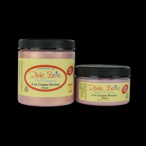 May include: Two jars of Dixie Belle Paint Company Copper Bronze Glaze. The larger jar is 8 ounces and the smaller jar is 4 ounces. Both jars are made in the USA.