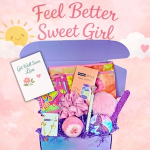 May include: A purple gift box filled with self-care items. Includes a card that says "Get Well Soon Lisa", a notebook, nail wraps, a pen, a bath bomb, earrings, and other accessories. The box has the text "Feel Better Sweet Girl".