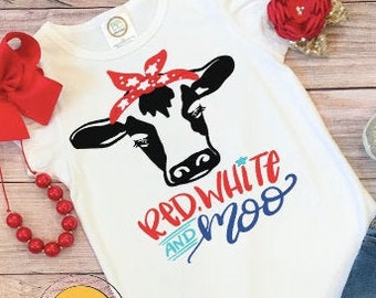 May include: White t-shirt with a black and white cow wearing a red, white, and blue bandana. The text "Red, White and Moo" is written in red, white, and blue on the shirt.