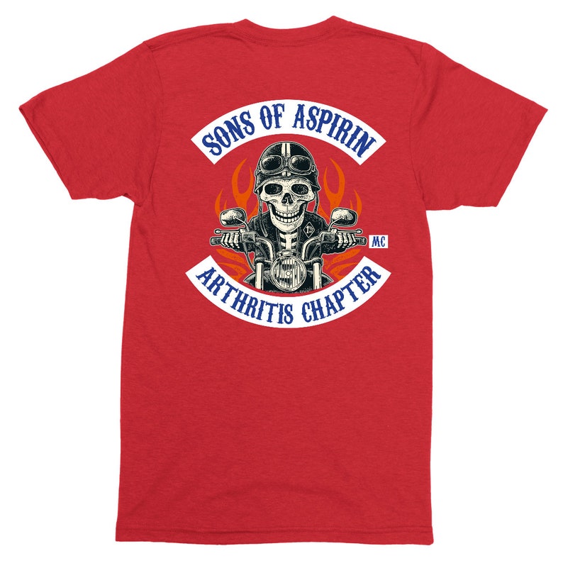 May include: Red t-shirt with a white patch that says "Sons of Aspirin Arthritis Chapter MC". The patch features a skeleton riding a motorcycle with flames behind it.