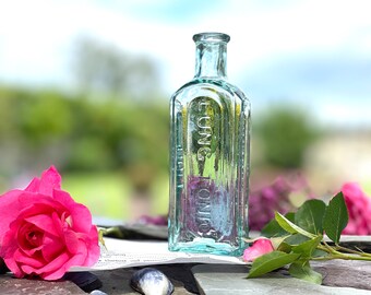 Antike aquagrüne Apothekerflasche: Viktorianisches Lung Tonic, Owbrückenrumpf