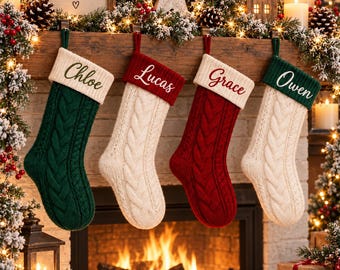 May include: Four cable-knit Christmas stockings hanging in a row. The first is dark green with a cream cuff labeled Chloe, the second is cream with a red cuff labeled Lucas, the third is red with a cream cuff labeled Grace, and the fourth is cream with a dark green cuff labeled Owen.