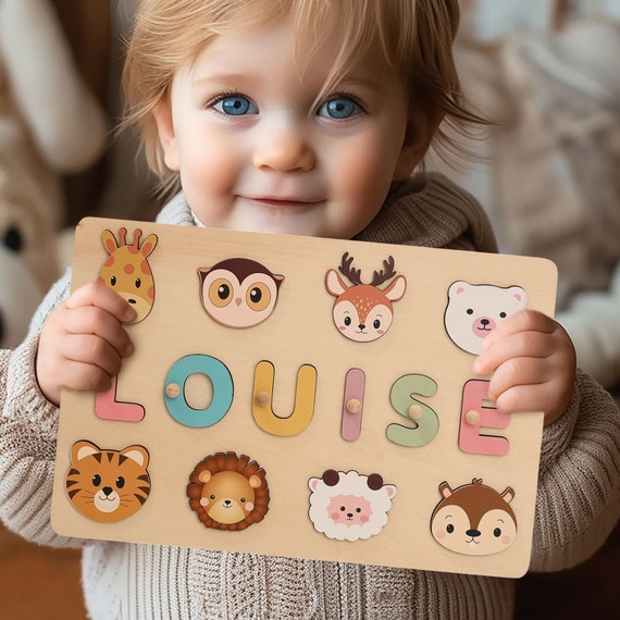 A wildly popular (1,859 hearts!) Montessori-style animal busy board that doubles as a personalized baby name puzzle — functional, educational, and genuinely handcrafted.
