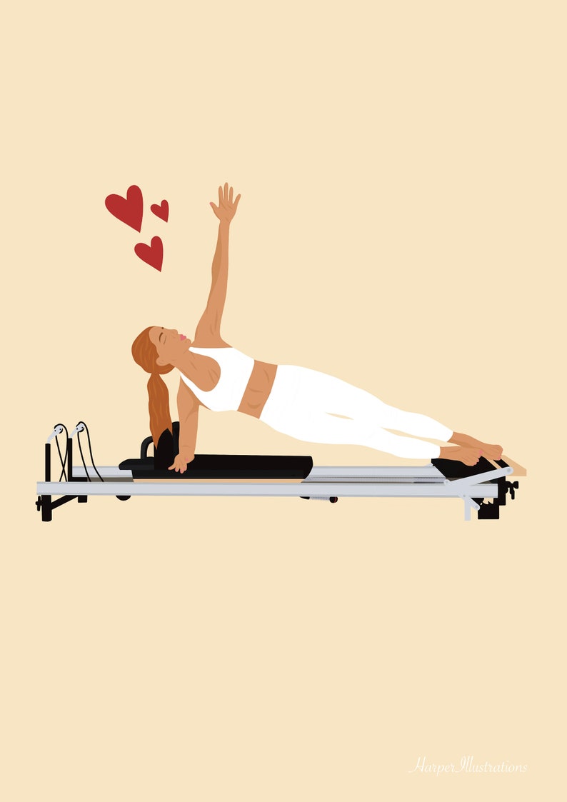 May include: A woman in a white sports bra and leggings performs a side plank exercise on a Pilates reformer. She has her right arm raised in the air and is looking up. There are three red hearts above her head.